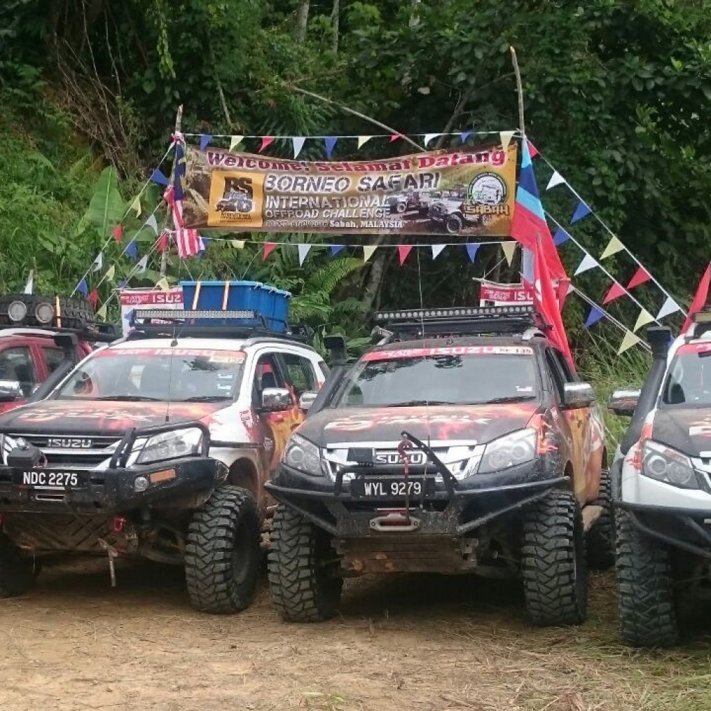 The four units of Isuzu Media Team cars comprised the mu-X (second left)...